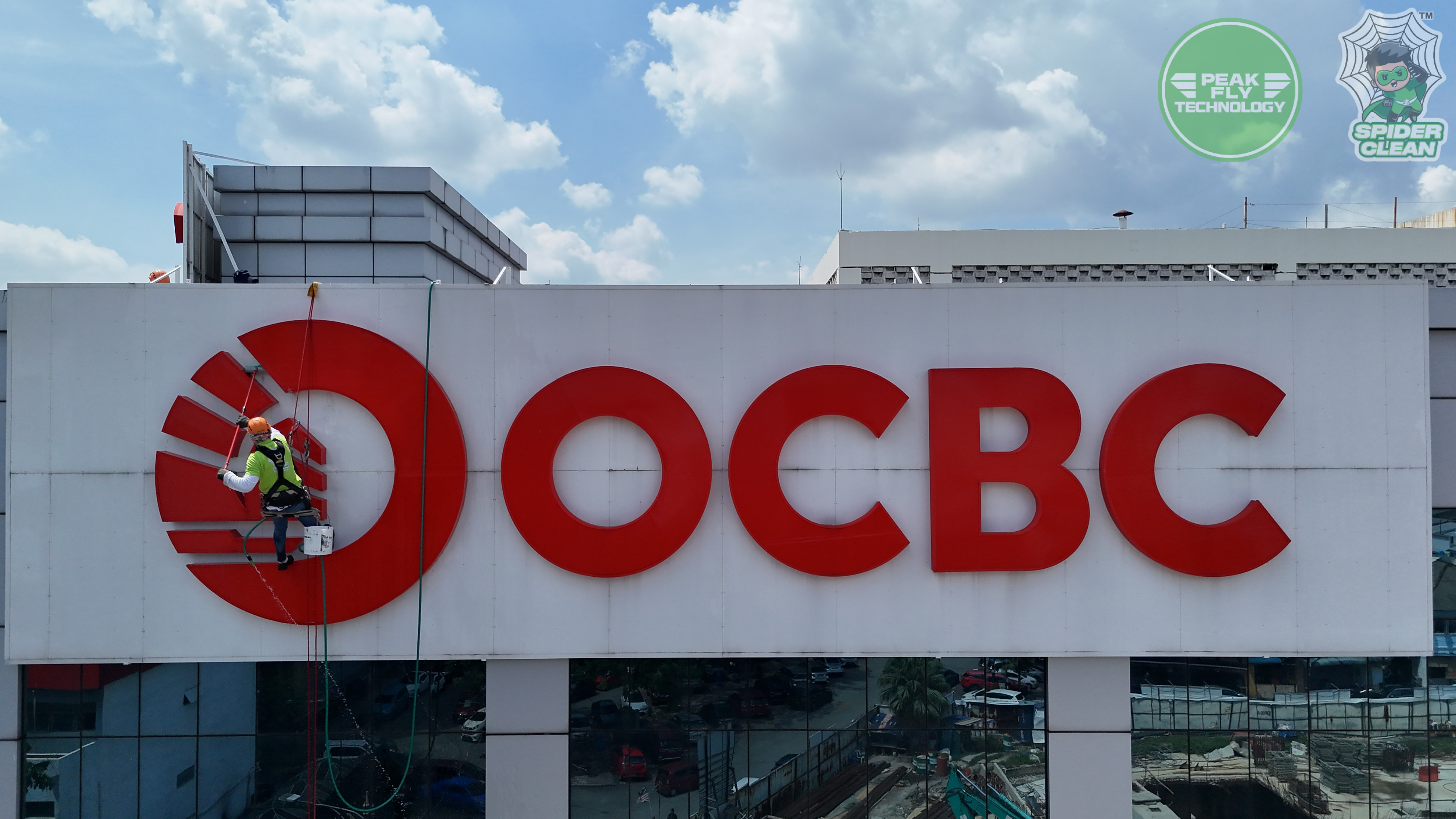 Peak Fly Technology (M) Sdn. Bhd. | Project - OCBC SIGNBOARD CLEANING (ROPE ACCESS)